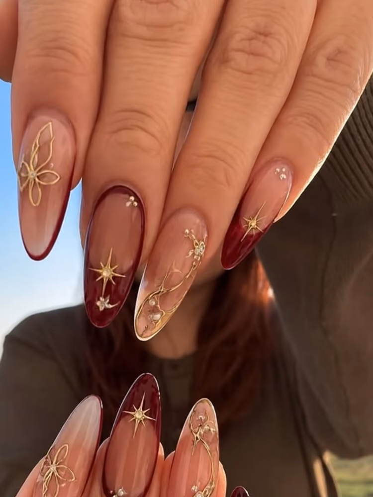 Milky white almond nails with tiny red hearts