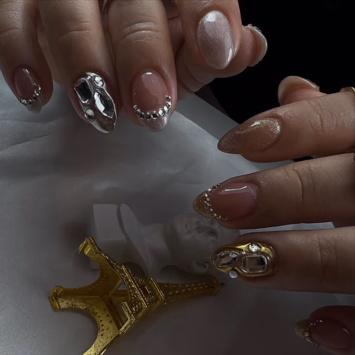 3d Sculpting, Chrome, Rhinestone Placement — nail work by Maya Nails & Beauty