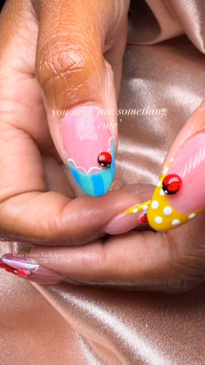Charm Placement, Encapsulation, Hand Painting — nail work by Main street Nails spa