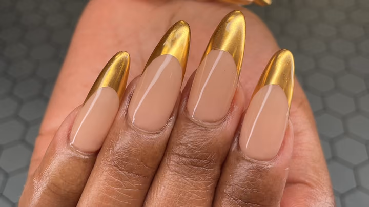 Apex Building, Chrome French — nail work by Sophy’s Nail Lab