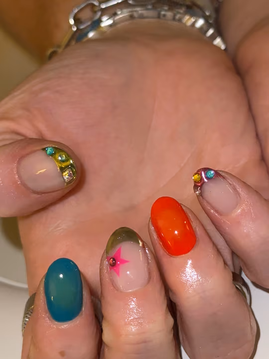 Airbrush, Encapsulation, Rhinestone Placement — nail work by MALIA M