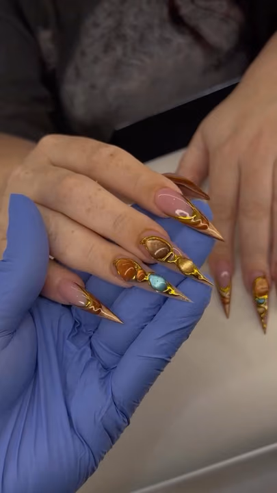 3d Sculpting, Cat Eye, Chrome, Extreme Length — nail work by sang nguyen