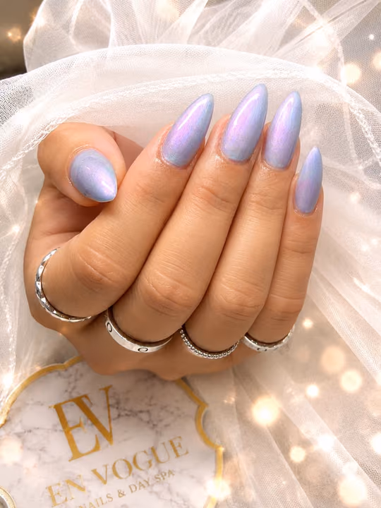 Chrome, Stiletto — nail work by En Vogue Nails Spa