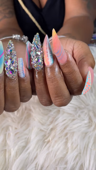 Airbrush, Stiletto, Crystal Placement, Marbling — nail work by Rachel Odom