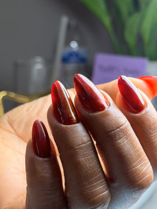 Apex Building, Cat Eye, Stiletto — nail work by Yudit’s Nails