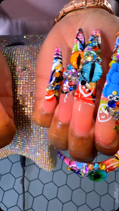 Charm Placement, Cat Eye, Crystal Placement, Extreme Length — nail work by Da Bling God