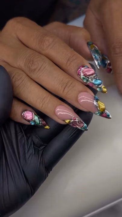 3d Sculpting, Cat Eye, Chrome, Gem Placement — nail work by sang nguyen
