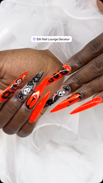 Character Art, Encapsulation, Stiletto — nail work by 5th Nail Lounge Decatur