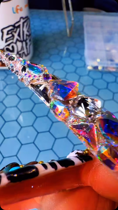 Encapsulation, Extreme Length, Gem Placement, Stiletto — nail work by Da Bling God
