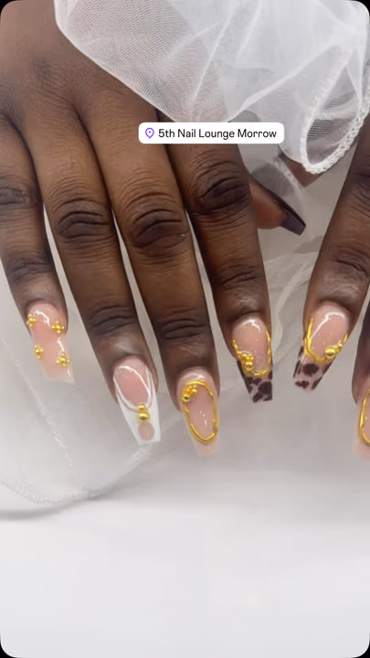 3d Sculpting, Animal Print, Charm Placement — nail work by 5Th Nail Lounge Morrow