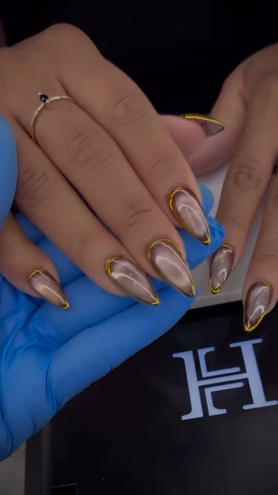 Cat Eye, Chrome, Stiletto — nail work by sang nguyen
