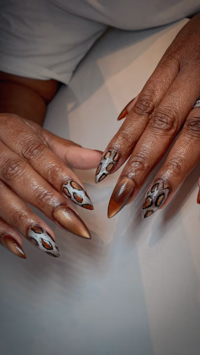 Animal Print, Cat Eye, Stiletto — nail work by NailzzwithANNIE