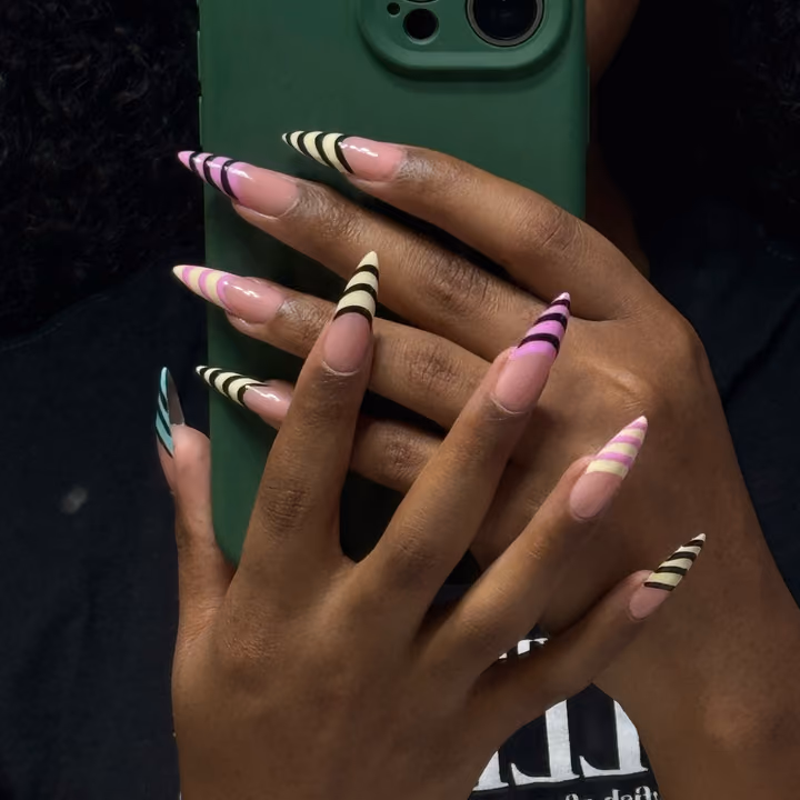 Line Art, Stiletto — nail work by Clayton County- Black owned