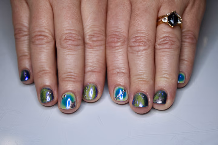 Aura Effect, Charm Placement, Magnetic Gel, Piercing — nail work by Lark & Sparrow Atlanta, GA