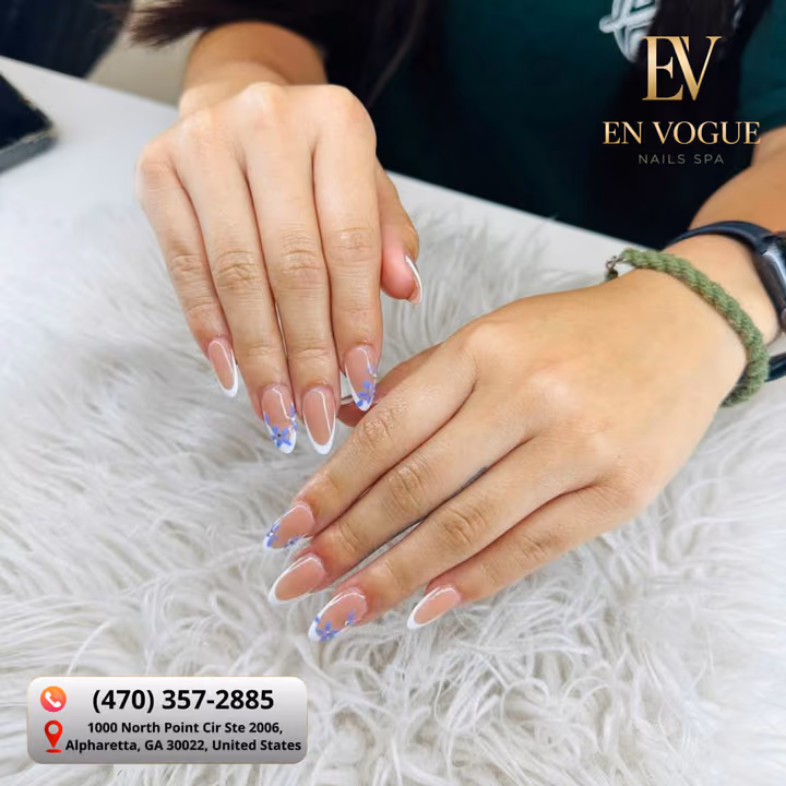 Almond, French Manicure, Hand Painting — nail work by En Vogue Nails Spa