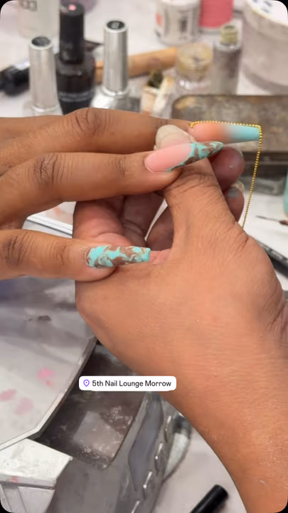 Airbrush, Chain Accent, Marbling, Piercing — nail work by 5Th Nail Lounge Morrow