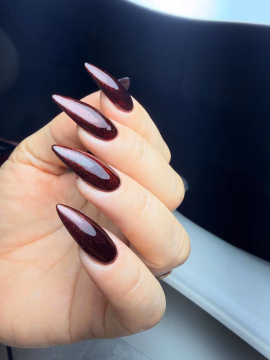 Apex Building, Cat Eye, Stiletto — nail work by Yudit’s Nails