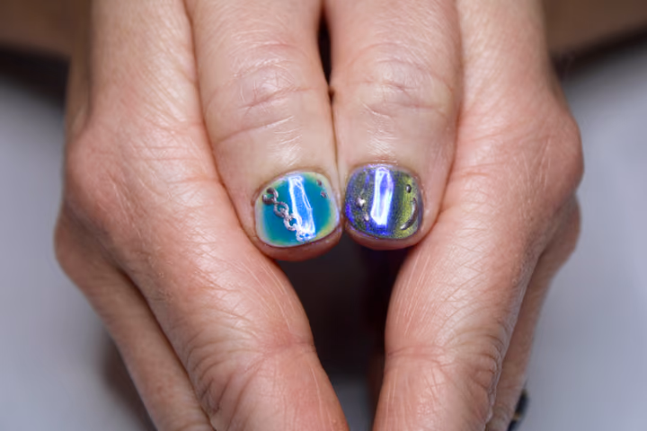 Aura Effect, Charm Placement, Magnetic Gel, Piercing — nail work by Lark & Sparrow Atlanta, GA